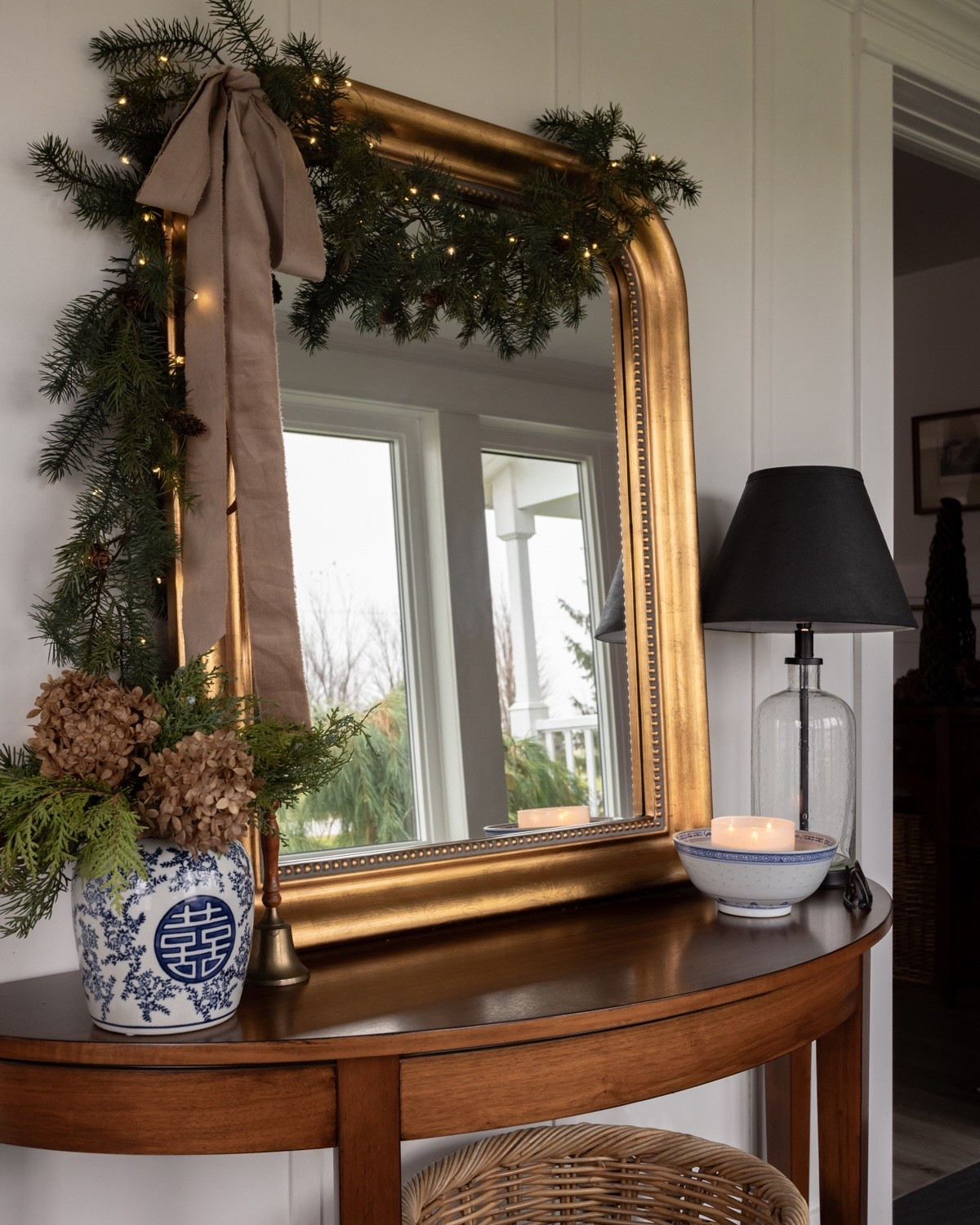 Last year’s Christmas mudroom with faux greenery, dried hydrangeas, and torn velvet ribbon. My gold arch mirror is back in stock and 50% off!

#LTKHome #LTKHoliday #LTKCyberWeek