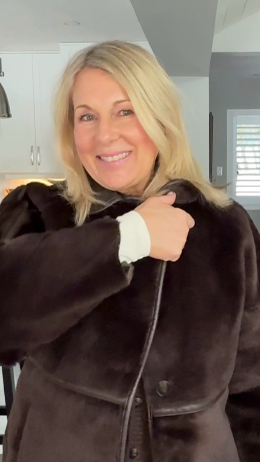 Wait till you see what is underneath. Starting firstly with a coat that I have on I bought this at H&M for $29. It couldn’t have been a better deal and I absolutely love this coat but underneath…..
When I tried on this vest, I fell in love with it right away. The fur collar the brown colour it is so pretty and what makes it so great as well is that the fur collar is removable so it’s like having 2 vests. I’m wearing it with my Levi’s baggy cinch I absolutely love these jeans. They fit amazing there’s no gaps in the waist, best jeans I own. My belt is from  Aritzia belt and brown boots are from Cosy Island. My purse is from coach and it was a Christmas gift and I’m in love with it. 
This was what I wore this weekend to visit friends. 
Do like it?

Jeans size 32
Vest size L
Coat size L
Lipstick Revlon 668

#LTKover50style #LTKmidsize