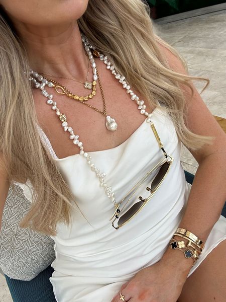 Dubai accessories - white mini dress, gold MV jewellery, Bottega sunnies, Pearl sunglasses chain from frame chain

#LTKFind #LTKstyletip #LTKSeasonal