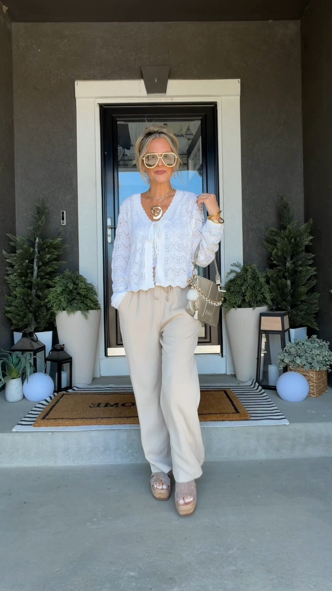 Lightweight outfit of the day with linen blend pants and a crochet cardigan sweater. I always reach for breathable layers this time of year, and this combination is perfect for staying cool while still having a little something extra when the mornings, evenings, or air conditioning get chilly. Effortless, comfortable, and easy to wear all summer.

#LTKootd #LTKmomlife #LTKOver40