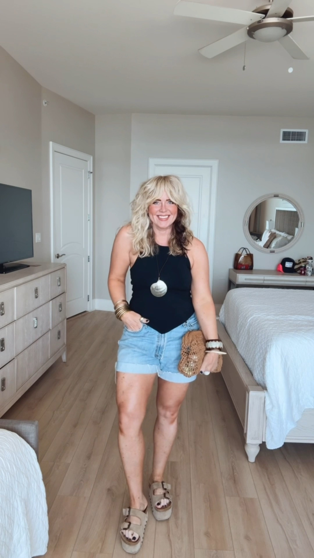 Loved this fit for our date night! This halter top is adorable and comes in more colors! It’s also double lined up too so no worries with a bra. I’m in a medium. 
My denim shorts were my hubby’s old jeans and I cut them off. They are very baggy but I love the fit. I’m a 30 in Levi’s and these are size 34.

#LTKgrwm #LTKootd #LTKOver40