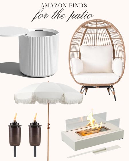 Cute finds for the patio from Amazon! I plan to spend a lot of time by the pool/on the patio this summer so I want to make it cute! 🤍

Wicker egg chair, tabletop fire pit, tiki torches, patio umbrella, outdoor cooler side table, neutral decor, outdoor furniture, fancythingsblog 

#LTKStyleTip #LTKSeasonal #LTKHome