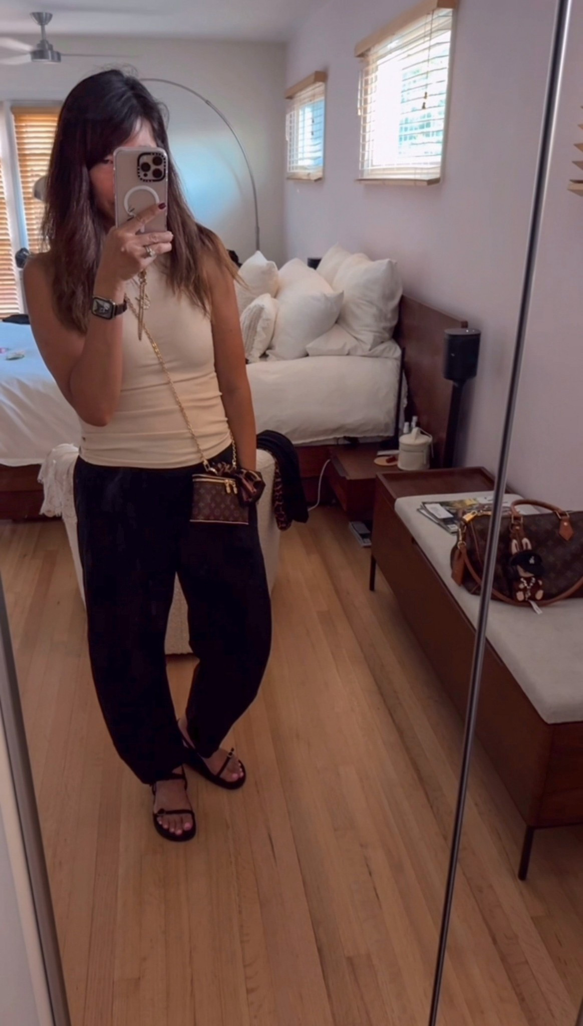 Weekend outfit in full swing 🤎
Converted my LV lipstick pouch into a mini crossbody (why didn’t I do this sooner?!) — the perfect little hands-free moment for errands and coffee runs ☕️💋
And these new barrel pants… OBSESSED. The silhouette gives just the right mix of relaxed + structured. I’ll be living in them this fall 👖✨ 

#LTKSeasonal #LTKItBag #LTKStyleTip