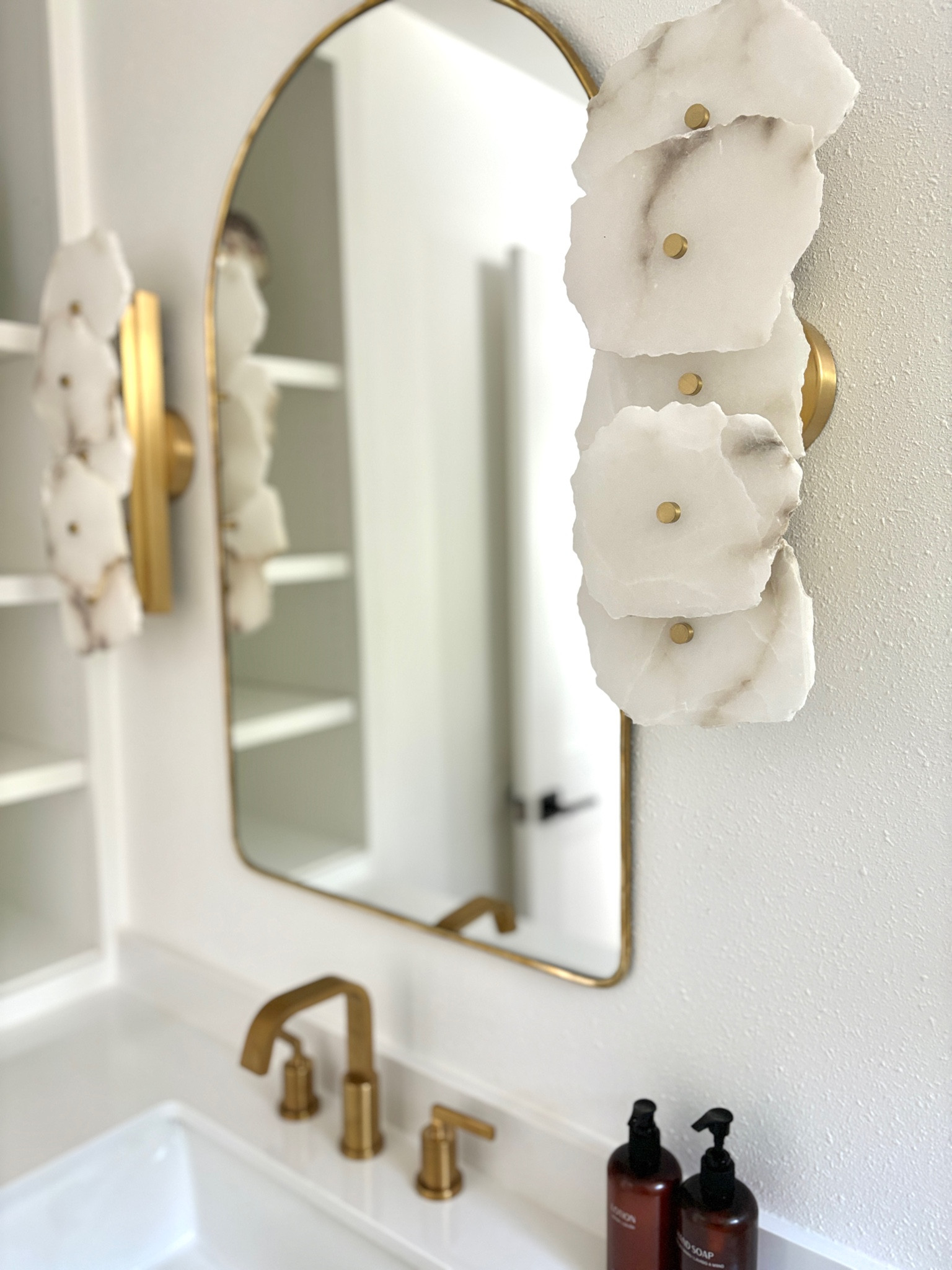 Modern wall sconces for your bathroom remodel! #bathroom #interiordesign #LTKxamaxon

#LTKHome