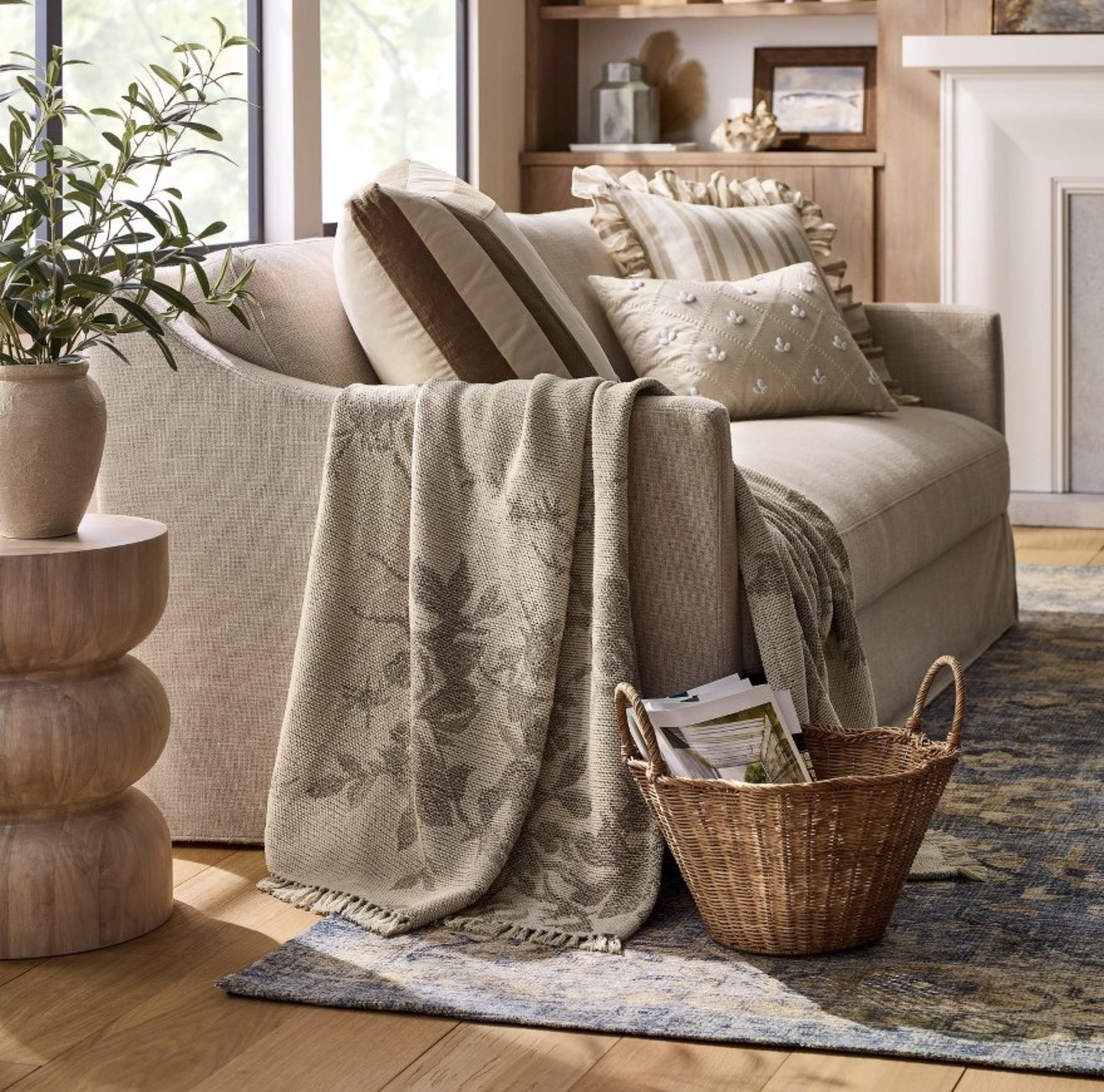 Layers that make a space feel lived-in 🤍 Soft upholstery, a cozy throw, and a woven basket add warmth without overwhelming the room.

#LTKHome