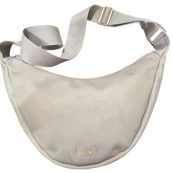 July Carry All Sling Bag in Sand Beige Canvas Crossbody Adjustable Strap | Poshmark