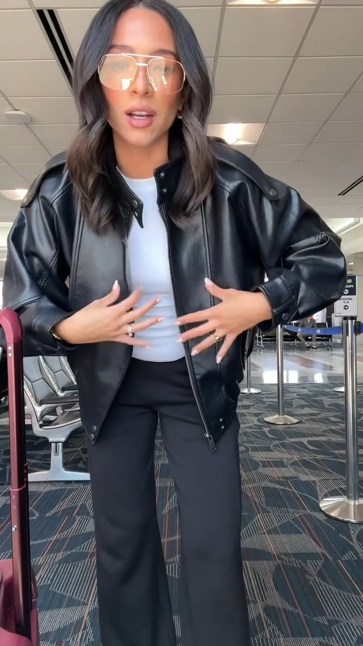Airport outfit! This faux leather jacket looks $$$ but it’s under $200 👏🏽 tons of compliments on this! Paired it with my favorite fitted tee and my go-to travel pants for a comfy chic travel outfit. Wearing a Small in jacket, small in t-shirt, and small reg length in pants. (Exact carry on is OOS in maroon but I’ve linked the exact version in beige)
