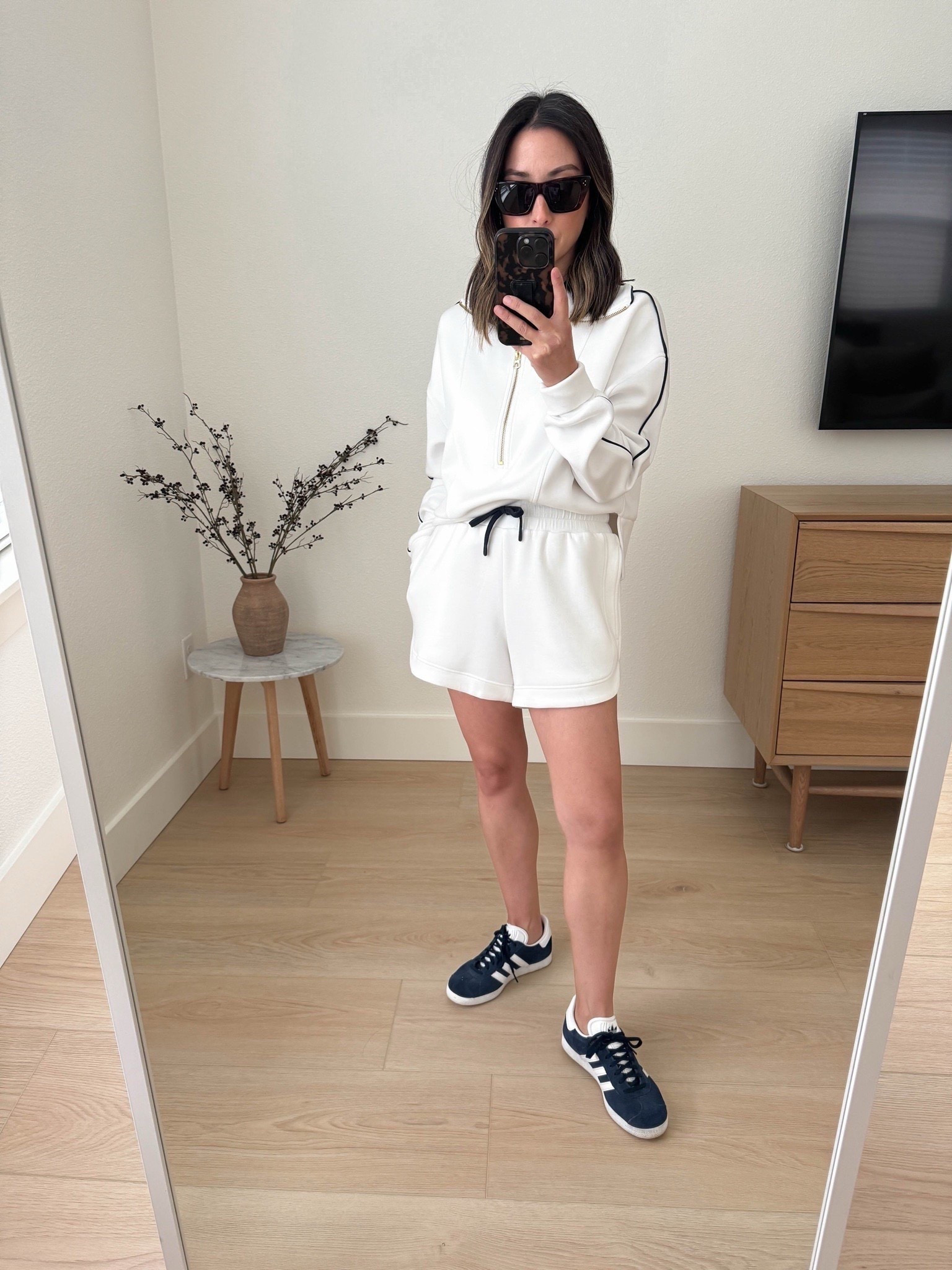 These sets from Varley are so good. Same material as their joggers. Hoodie is cropped so makes it super easy to tuck!

Varley pullover xs
Varley shorts xs
Adidas sneakers 5 women’s. 
Celine sunglasses  

Petite style, spring outfits 2026, sneakers, athleisure, mom outfits 


#LTKActive #LTKPetite #LTKmomlife