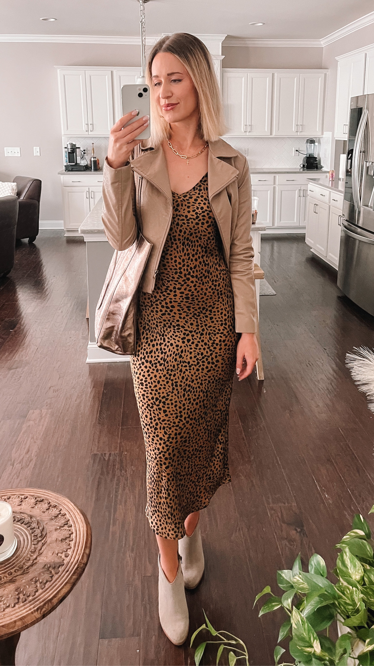 Wow! Fall is really here - time really does fly faster the older you get 😆 While I’m sad about the end of summer, I always enjoy throwing together a good transition look 👀 This silk dress, booties, and faux leather jacket is perfect for the changing season! 

#LTKSeasonal #LTKstyletip