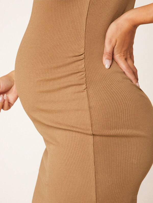 SHEIN BASICS Maternity Solid Bodycon Dress  SKU: sa2302275984460578(25 Reviews)$14.99$14.24Join f... | SHEIN