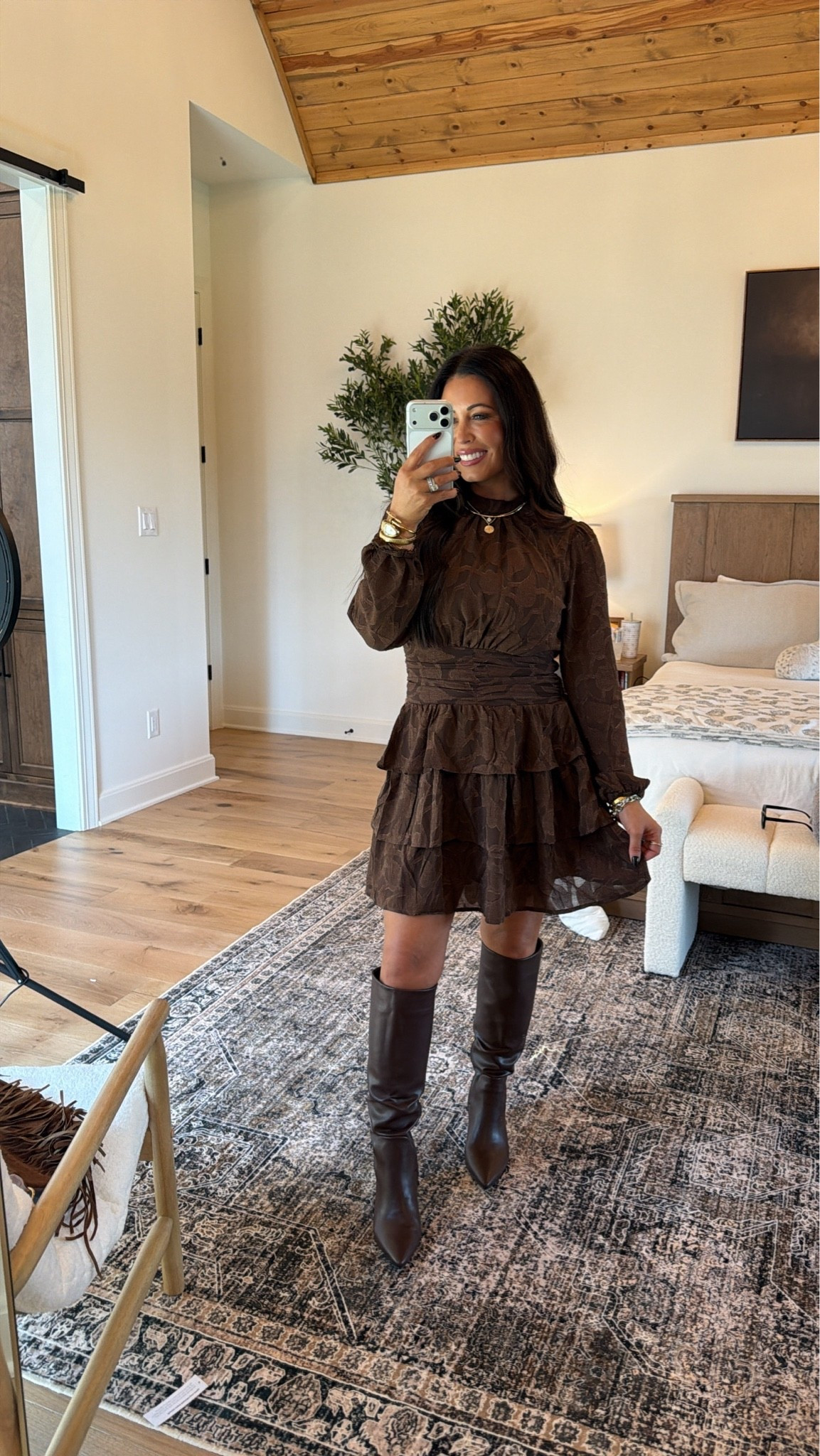 Chocolate brown is having a moment 🤎 This gorgeous long-sleeve mini dress features the prettiest texture, flattering waist and tiered skirt. Styled with tall brown boots for the perfect fall date-night look!
#BrownDress #FallDress #DateNightOutfit #TallBoots