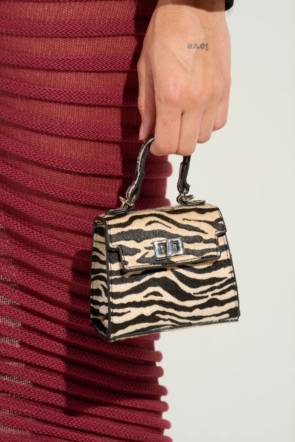 WILD ONE ZEBRA MINI PURSE | AKIRA