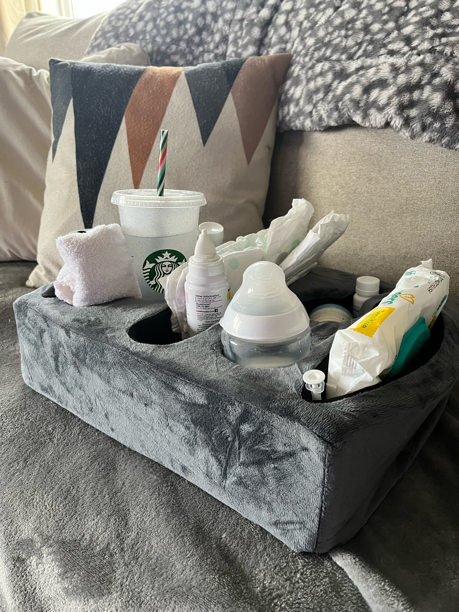 Mommy must have!!! This couch buddy is a life saver for keeping everything you need for a baby organized 

#LTKbaby #LTKfamily #LTKhome