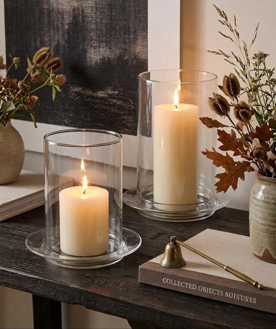 These glass pillar hurricane holders bring that classic, warm Nancy Meyers aesthetic straight to your home. The stepped glass base creates an elevated look for effortless ambient lighting.#targethome #cozylighting #homedecor #interiorstyling

#LTKHome #LTKSeasonal