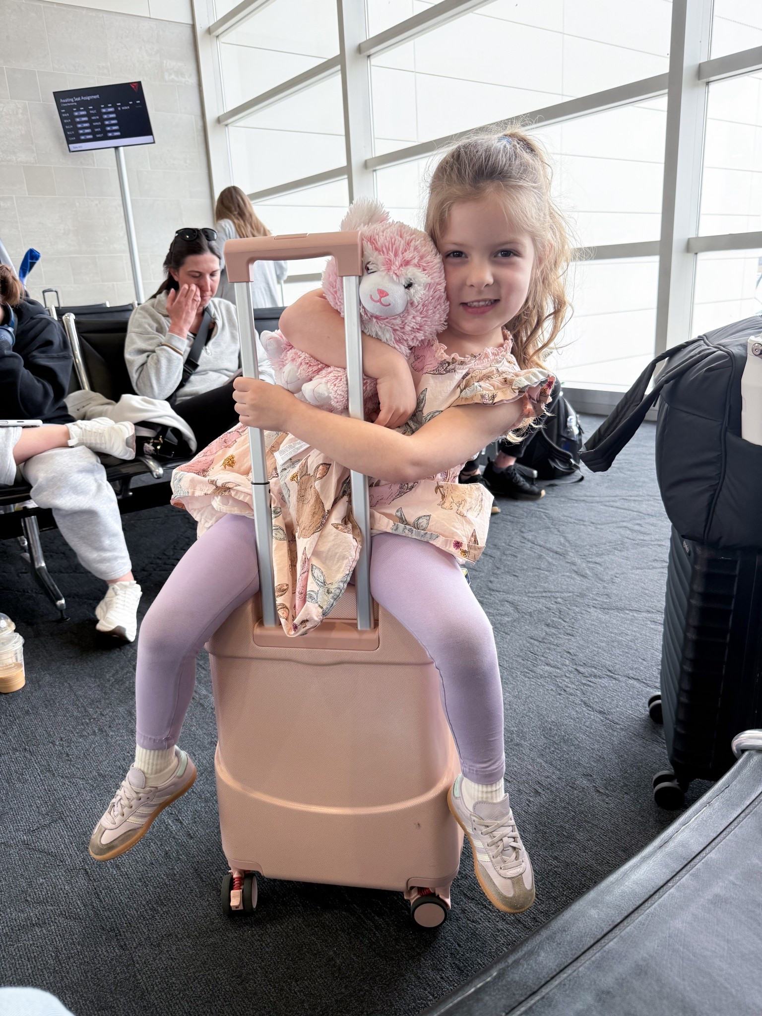 This suitcase was the best for the airport with my daughter!!  Got so many compliments on it 

#LTKTravel #LTKKids