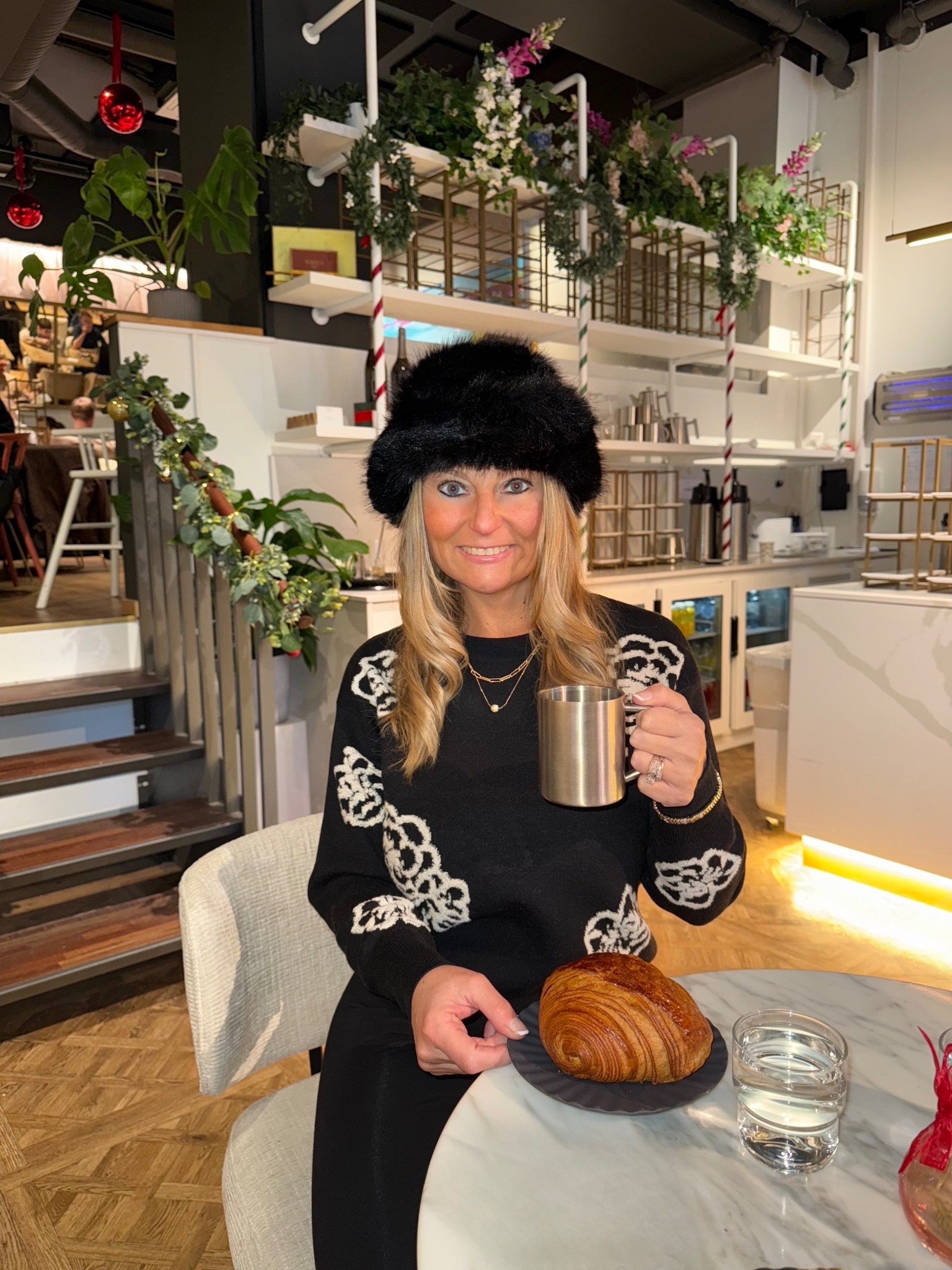This Target hat is not only super affordable, but it’s on trend with this winter’s faux fur trend. It actually kept me surprisingly warm exploring Oslo, too. I paired with this Tahari sweater that is giving major European vibes. 

#LTKGiftGuide #LTKHoliday #LTKCyberWeek