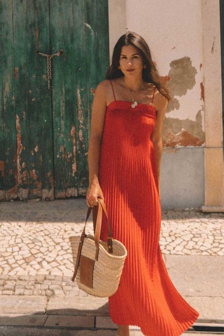 Chic Summer Travel Outfit. 

Sarah Butler of @SarahChristine wears red pleated midi dress with spaghetti straps and plisse detailing in Lisbon, Portugal. 

Summer outfits, summer outfit ideas, casual summer outfits, stylish travel outfits, summer outfits 2023, red dress, pleated midi dress, Portugal travel outfits.

#LTKtravel #LTKSeasonal #LTKeurope