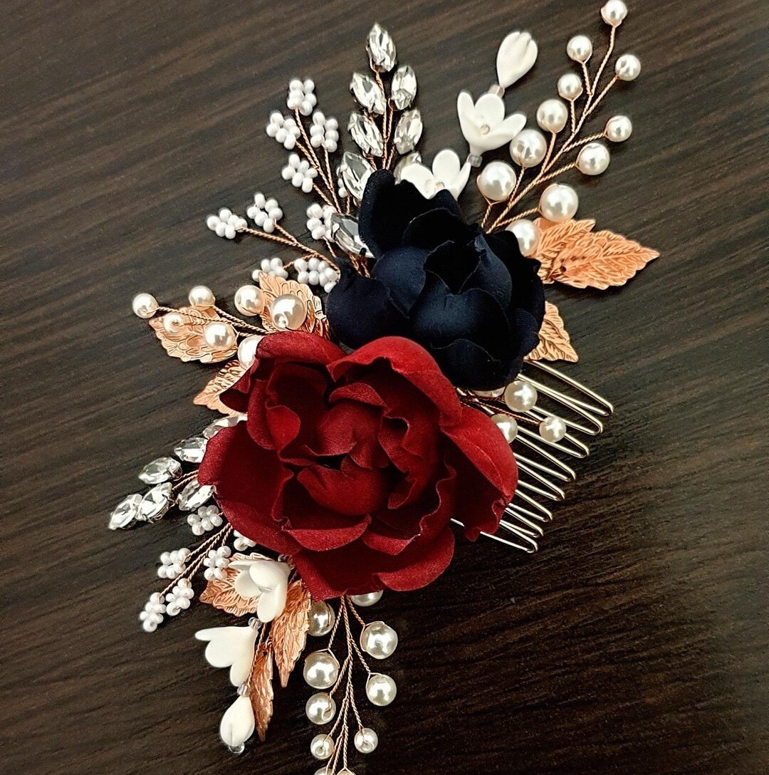 Complete your bridal look with this elegant burgundy and navy silk flower hair comb, designed to add rich color and timeless charm to your wedding style. Featuring delicate silk blooms accented with pearls, crystals, and leafy details, this lightweight piece is flexible and easy to style with veils, updos, or flowing curls. The deep marsala tones make it a stunning choice for romantic, fall, or classic weddings. #burgundywedding #bridalhair #weddingaccessories #marsalawedding #bridalstyle #ltkbride #weddinginspiration

#LTKSpringSale #LTKWedding #LTKSeasonal
