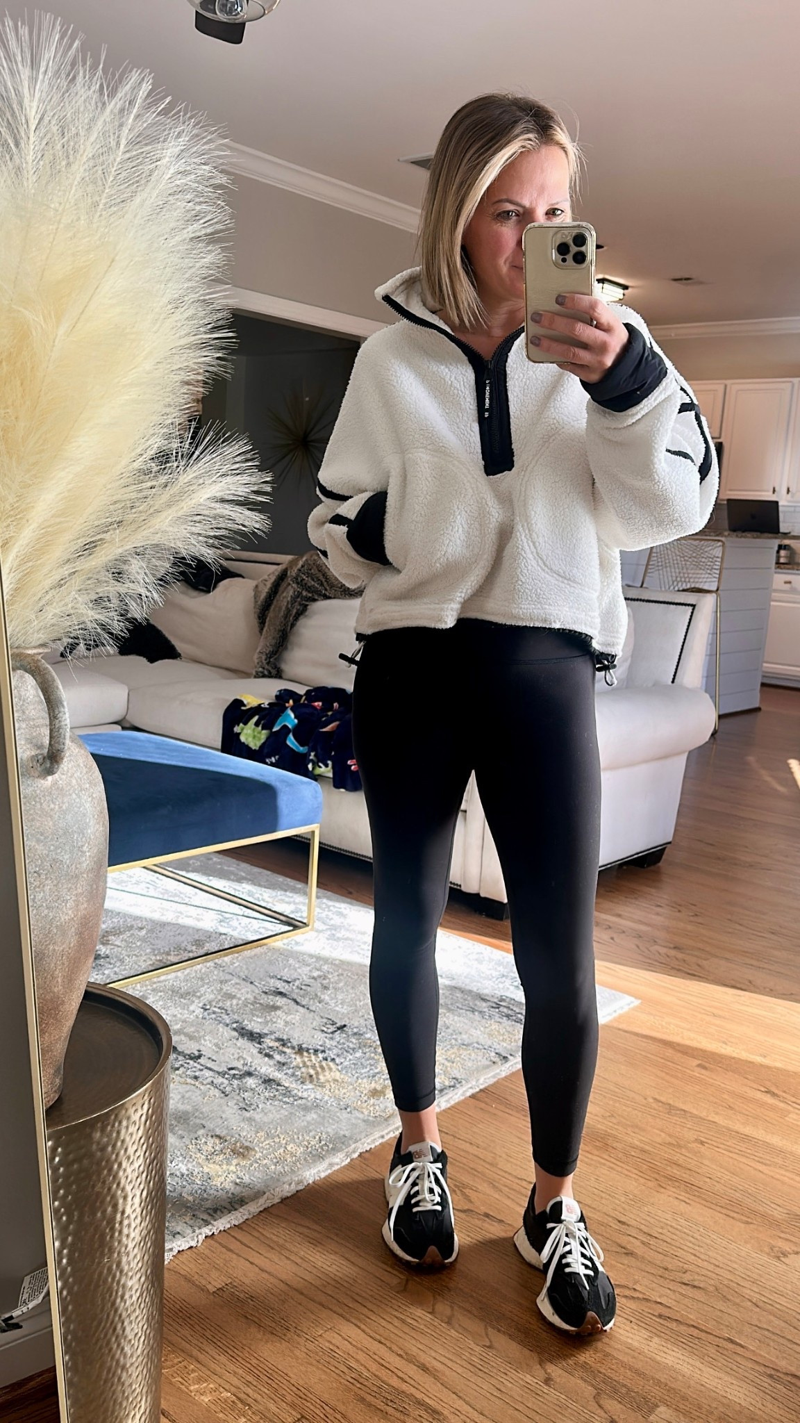 Free people mountain high fleece paired with black leggings and new balance 

#LTKShoeCrush #LTKSeasonal #LTKStyleTip