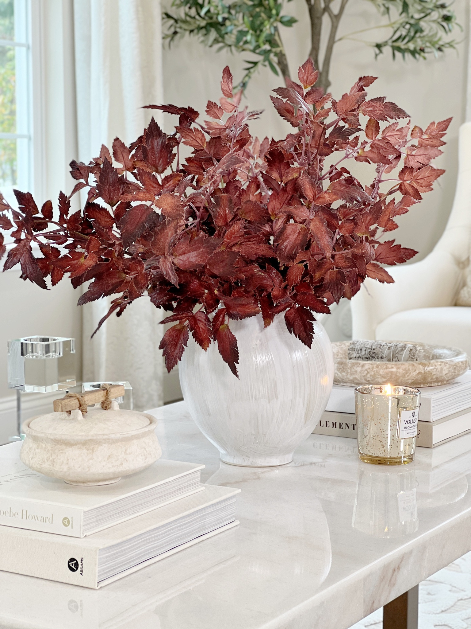 Shop my fall coffee table decor and family room!

Fall stems 
Fall candles 
Coffee table books 

#LTKhome #LTKSeasonal #LTKU