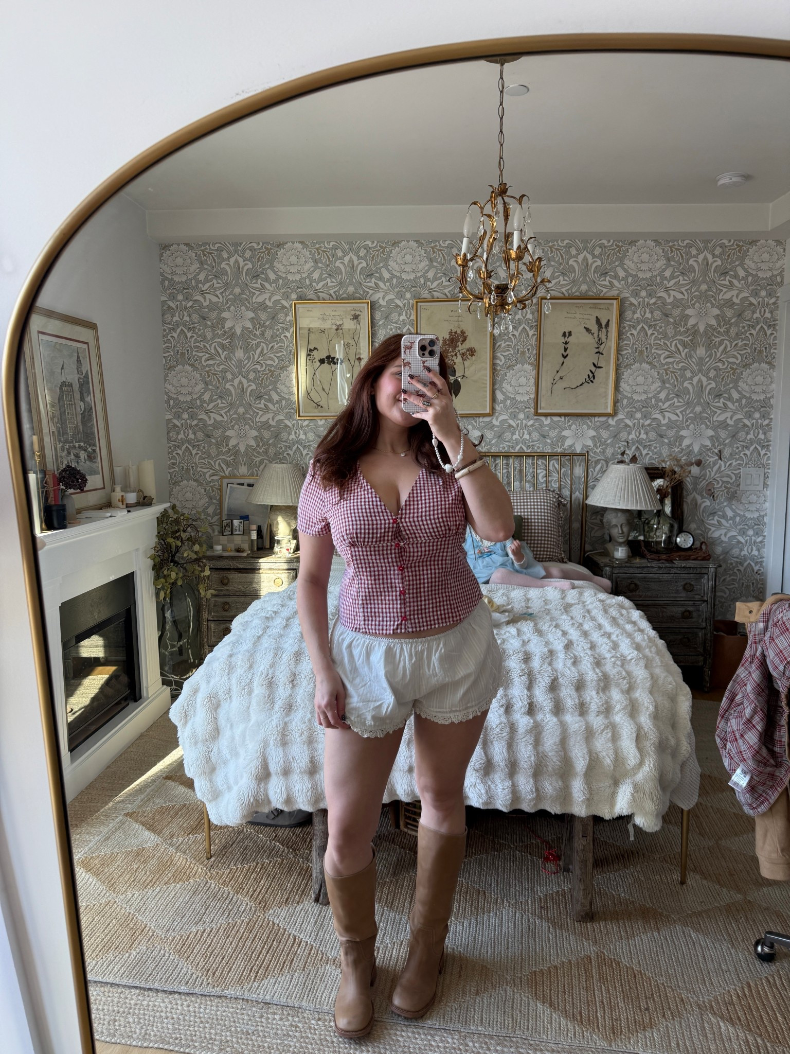 Gingham red blouse princess Polly
White bloomer shorts 
Wide calf Steve Madden boots

#LTKFestival #LTKMidsize #LTKSeasonal