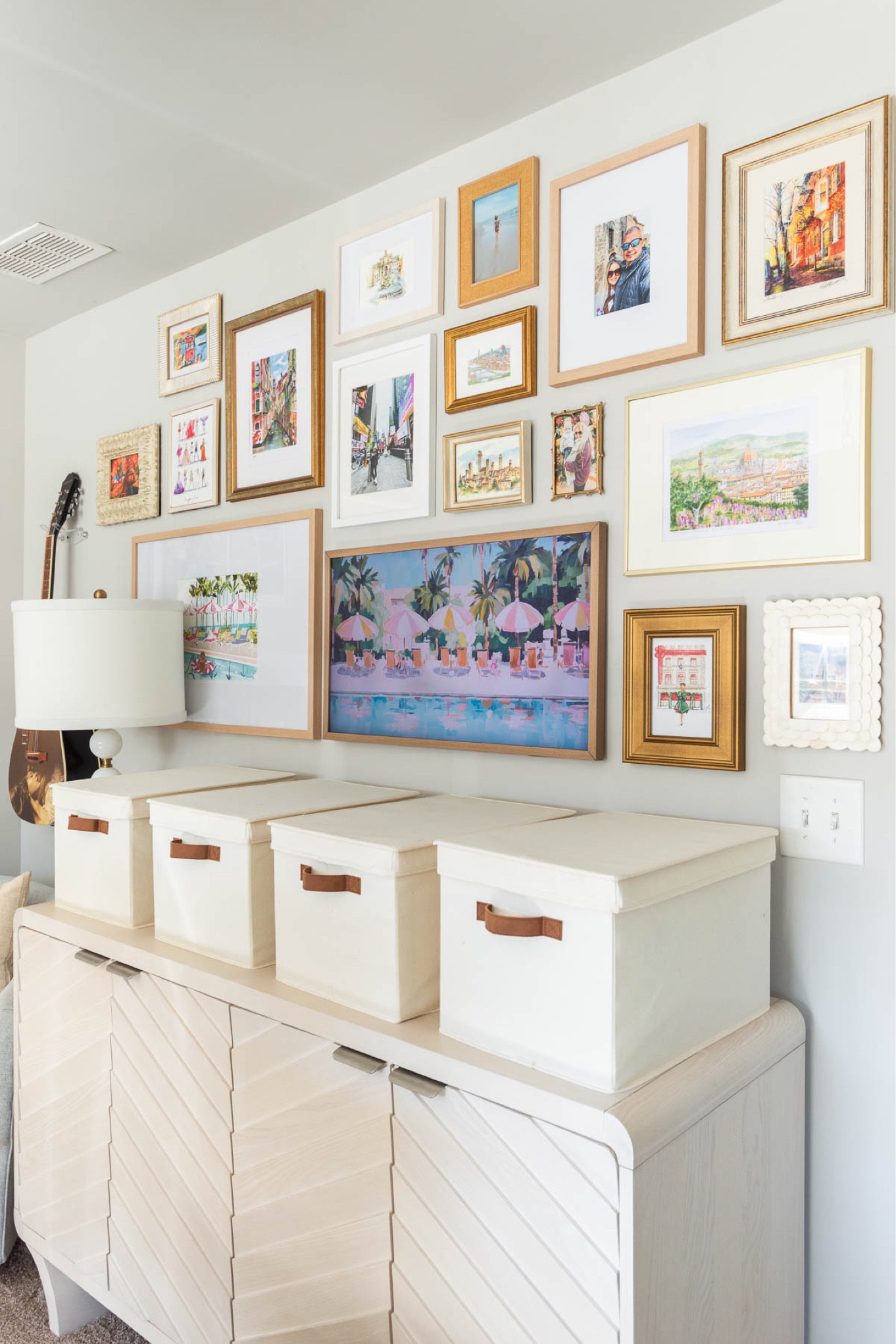 One of my favorite home projects ever is creating this “wall of happiness” in my home office, that includes art prints from my travels, personal pieces and a Frame TV, where I can change the art with my mood or the season. home decor office decor wall decor gallery wall large wall decor picture frame guitar mount canvas storage bin#LTKStyleTip

#LTKHome #LTKFindsUnder50