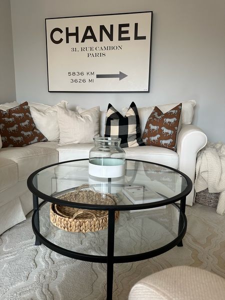 chanel road sign
white sectional couch
pottery barn coffee table
serena & lily vase

#LTKunder100 #LTKstyletip #LTKhome