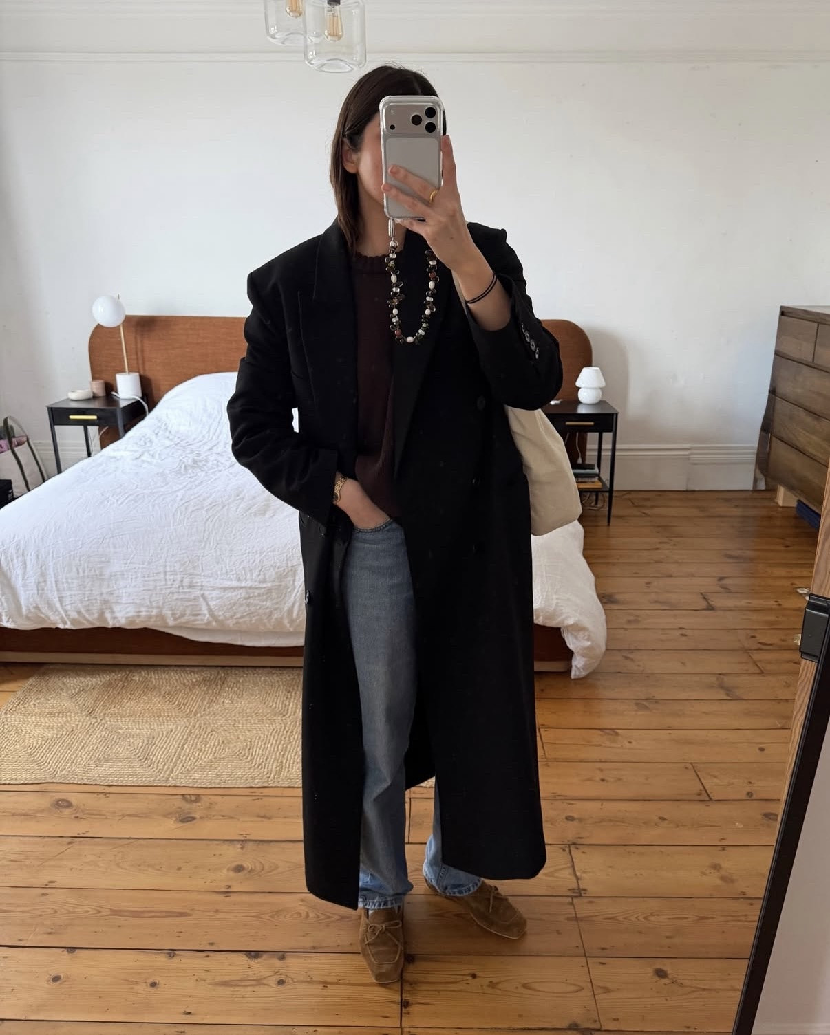 Smart casual weekend look, elevating brown knit and blue denim with a tailored black coatt

#LTKspring #LTKwinter #LTKstyletip