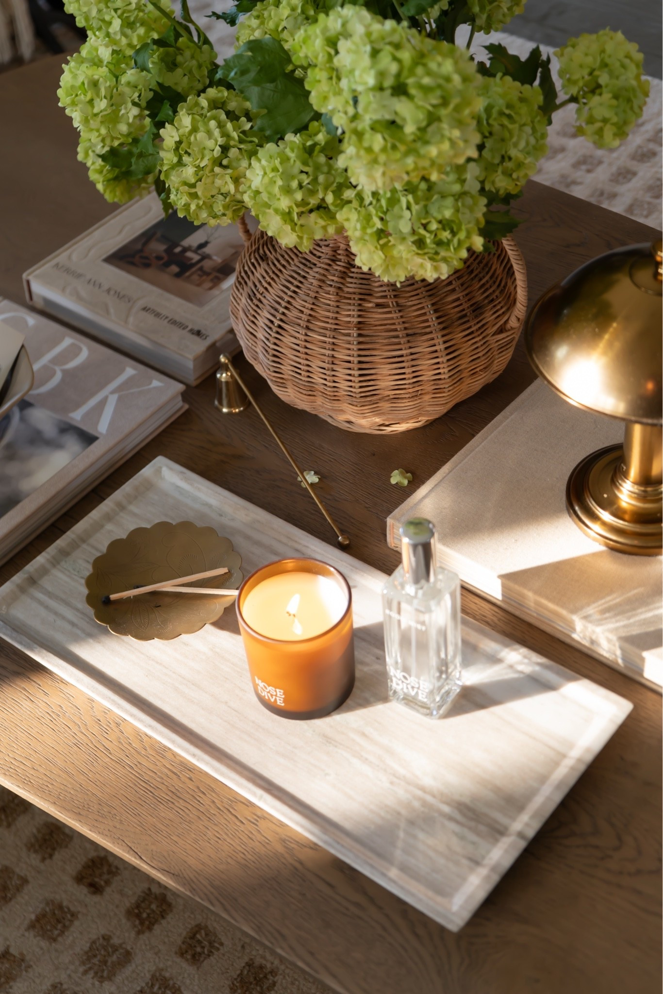 Spring coffee table styling that still feels moody 🤎✨

#LTKHome #LTKSaleAlert #LTKSeasonal