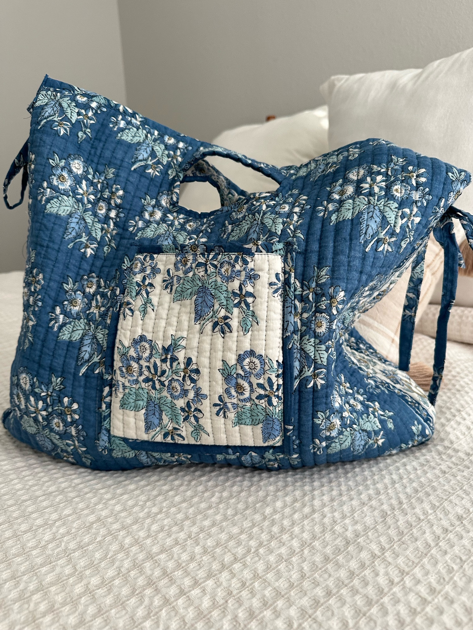 Quilted tote bags are IN!!!!! This one is from #PotteryBarn it’s so light/thin fits so much and comes in two patterns😍🦋💙🩵

#quiltedbag #totebag #travel #kids #baby 

#LTKSaleAlert #LTKItBag #LTKTravel