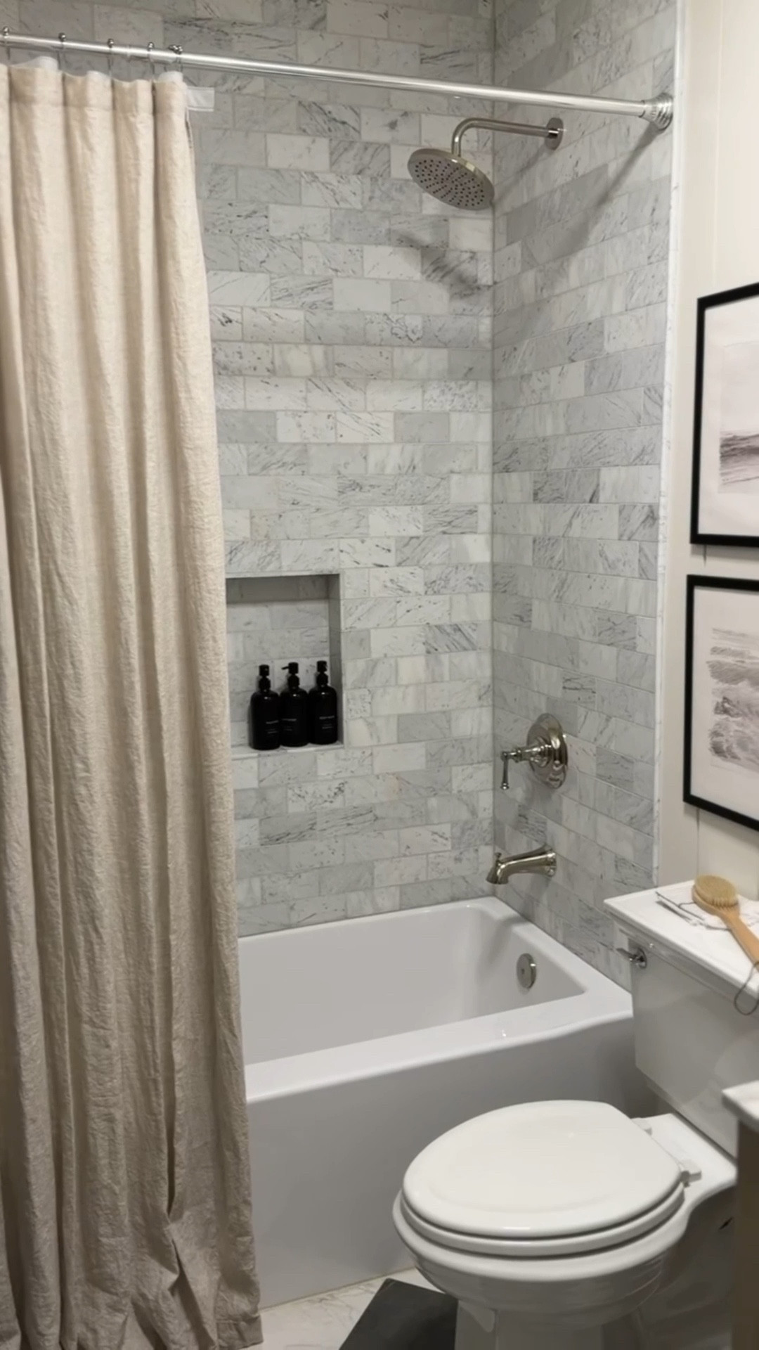 Our guest bathroom has come a long way since we bought our home. For this space, I chose very timeless pieces. Neutral tiles, polished nickel hardware and plumbing, and I created height with an extra long shower curtain. This space feels classy and comfortable! 

#LTKHome