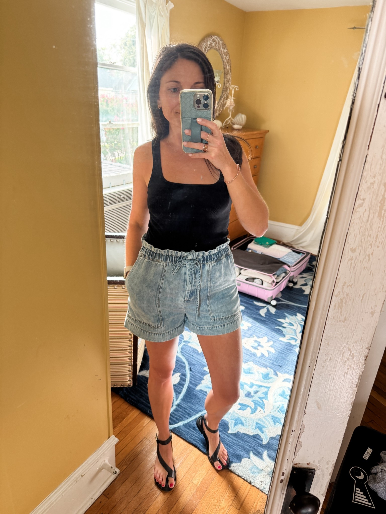 Summer travel outfit. Love these Rails shorts and this black tank has been a staple all summer! 

#LTKTravel #LTKFindsUnder100 #LTKSeasonal