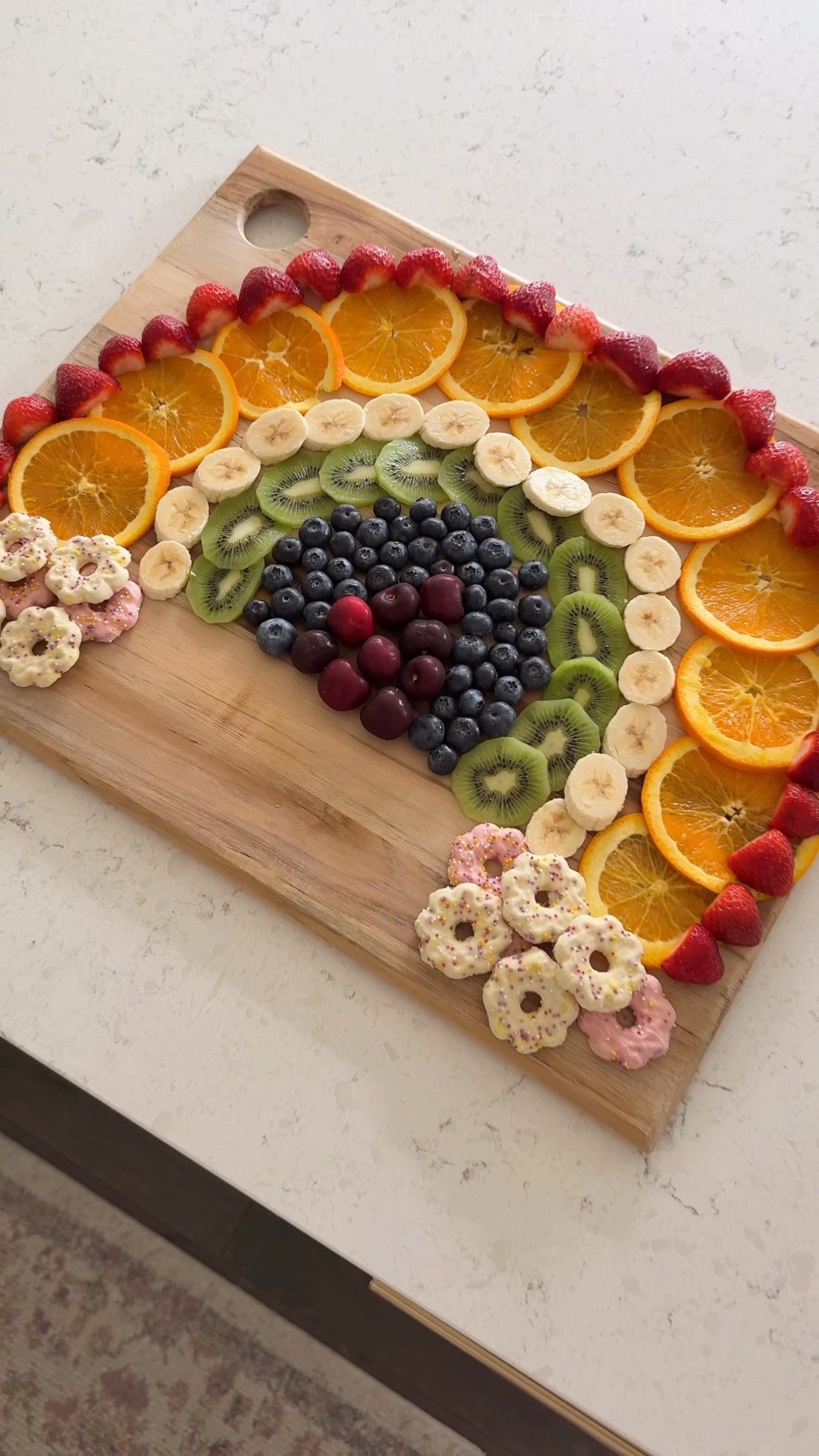 How fun would it be for the kids to wake up (or come home) to this rainbow fruit tray for St. Patrick’s Day?! 🌈🍀 Such an easy and healthy way to make the day feel a little extra magical. You could even add chocolate gold coins at the end of the rainbow for a fun little treat 💰✨

Also, did anyone else love that Irish jig dance in Sinners? 😆 Love that the movie won so many awards at the Oscars! #stpatricksday #rainbowfruit #stpatricksdayfood

Fruits, cutting board, cookies, banana 

#LTKfoodie #LTKFestival #LTKHome