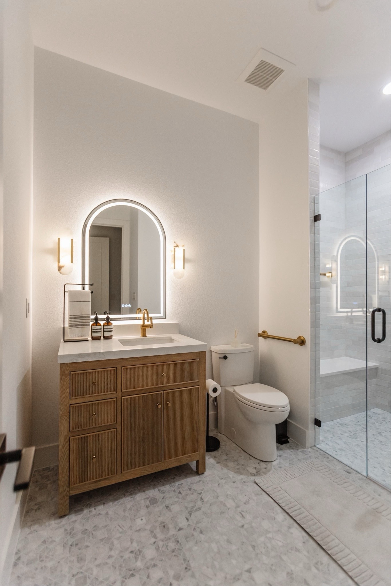 Our addition bathroom we did with our tile, mirror, lighting and more form Wayfair! I love the color way the bathroom turned out 

#LTKStyleTip #LTKHome