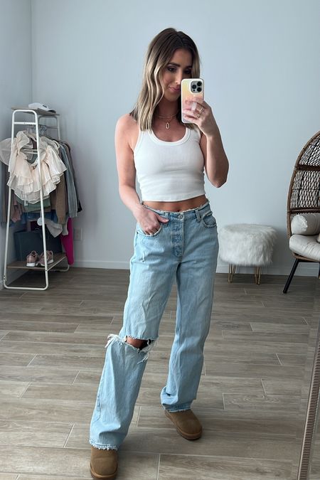 Mid rise jeans (called low rise but are actually mid rise) 90s style straight jeans run big! I would size down one size. Tank runs tts 

#LTKunder100 #LTKsalealert #LTKstyletip
