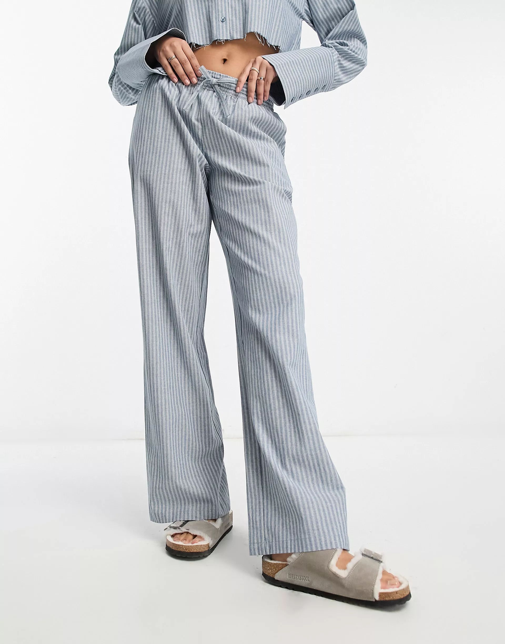 NA-KD x Hanna Schonberg co-ord drawstring trousers in blue stripe | ASOS (Global)