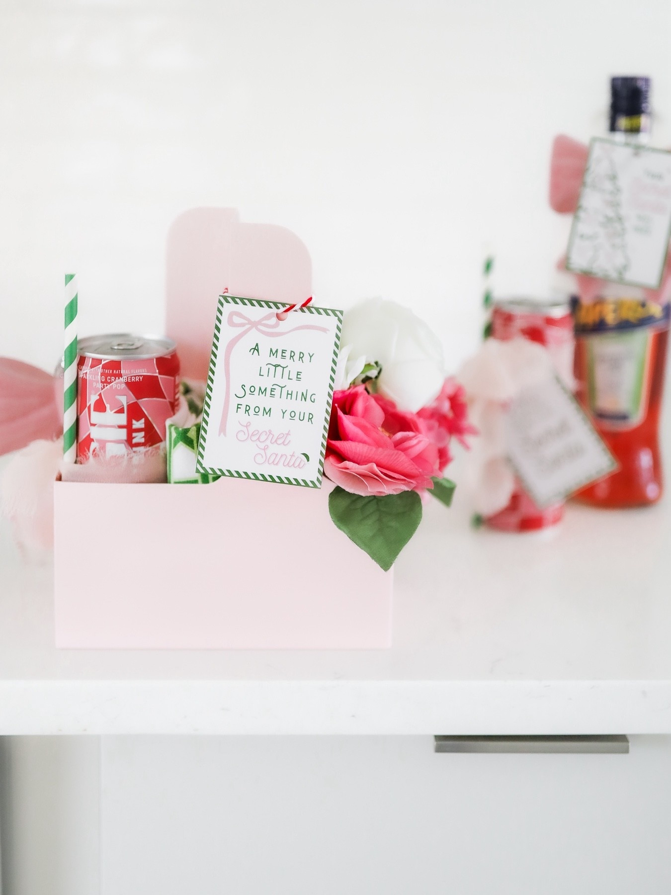 Cute Secret Santa gift idea under $25! Grab a cute pink drink holder, add a few of your Secret Santa’s favorite budget-friendly things (like an energy drink, tea towel, and pretty faux flowers they can enjoy all year long!), and then attach a cute gift tag! So cute and easy!

#LTKCyberWeek #LTKHoliday #LTKGiftGuide