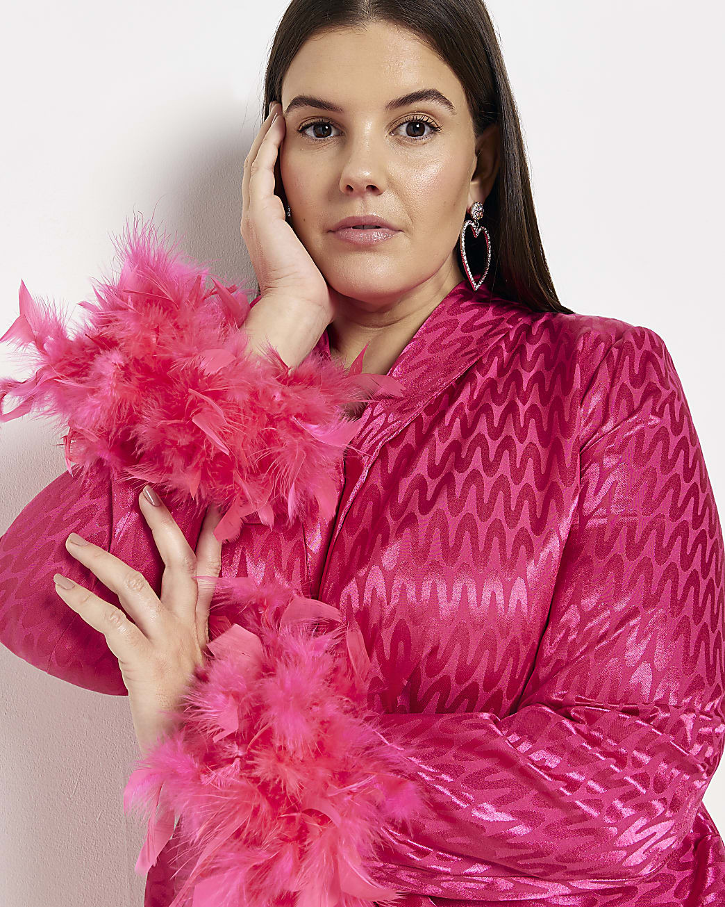 Plus pink satin feather trim wrap mini dress | River Island (US)