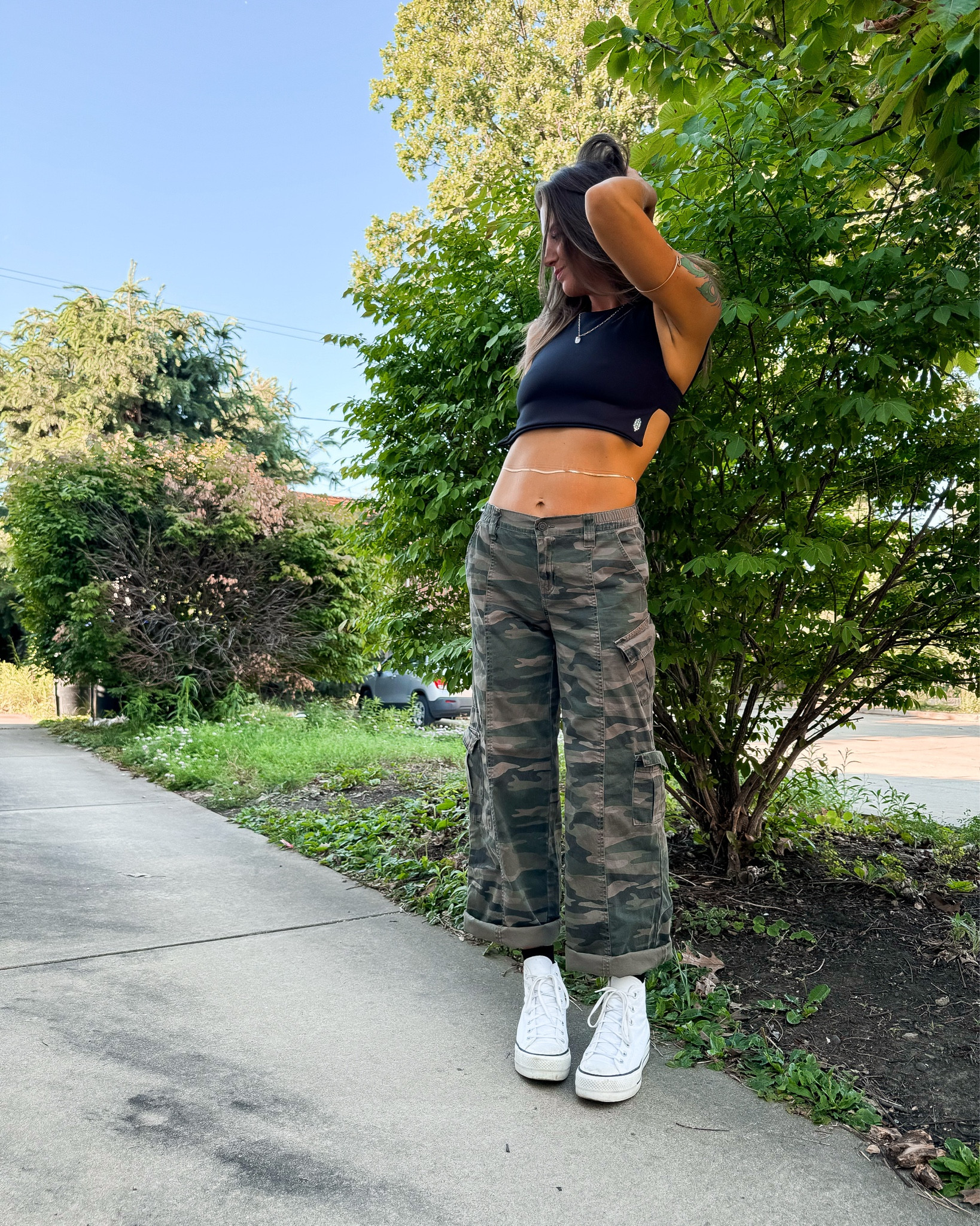 Casual girls dinner vibe 🖤
Free People Movement crop top | PacSun baggy low rise cargo pants | platform converse | Etsy/amazon jewelry | free people arm cuff | summer outfit | girls night outfit | looks for less
#freepeoplestyle #summerstyle #leanbodies #jewelryaddict #stylediary 

#LTKSeasonal #LTKFindsUnder50 #LTKStyleTip