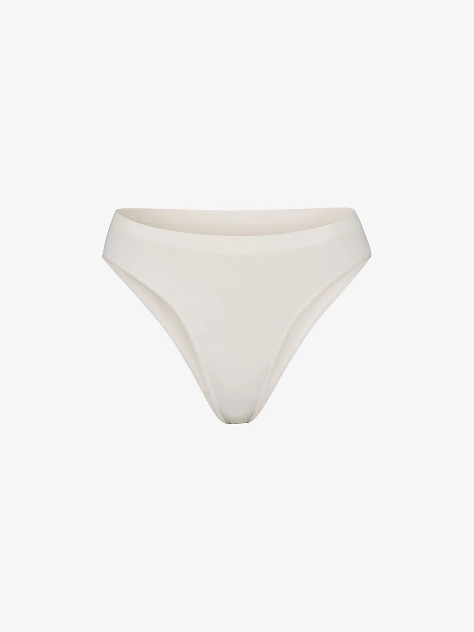 Smoothing mid-rise stretch-woven thong | Selfridges