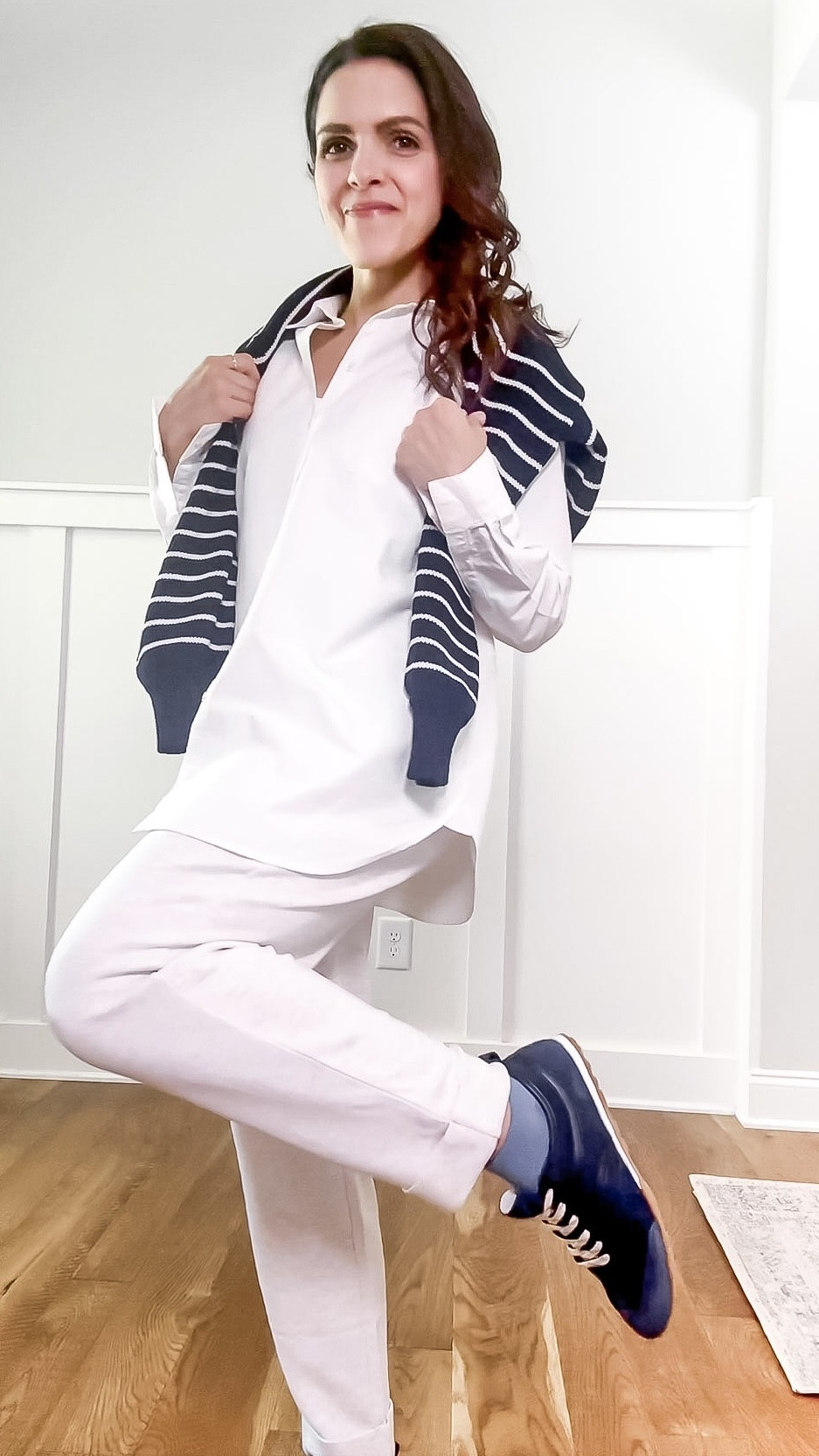 Outfit formula: sandwich method | Repeat a color at the top and bottom of the outfit to make everything feel more connected. 

White button-down, navy striped sweater, cream sweats, navy sneakers.

#LTKootd #LTKgrwm