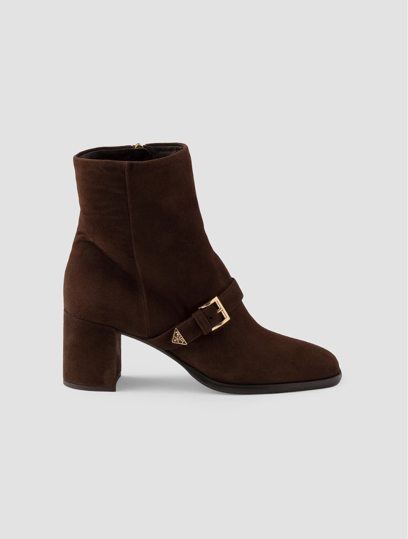 Tired of fall shoes that make every outfit feel the same? These Prada Suede Booties bring soft suede texture and a sleek designer silhouette to jeans, trousers, skirts, and dresses. Prada’s current suede bootie collection includes refined styles with signature logo details and versatile heel heights, making them an elevated choice for fall and winter wardrobes. 

 #LTKdayinmylife #LTKvlog #LTKOver40
