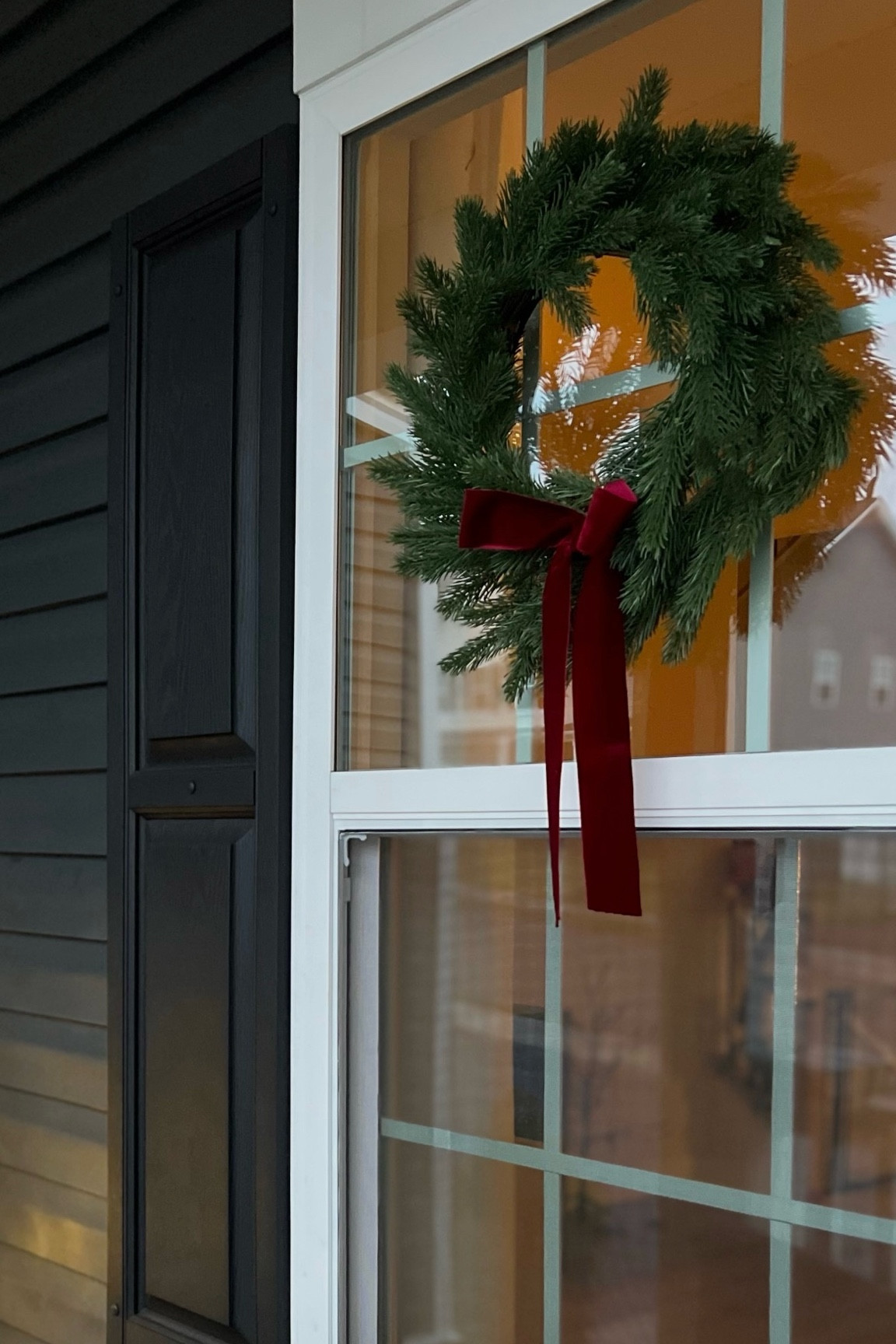 Outdoor wreaths from Michaels with added bows from Amazon 