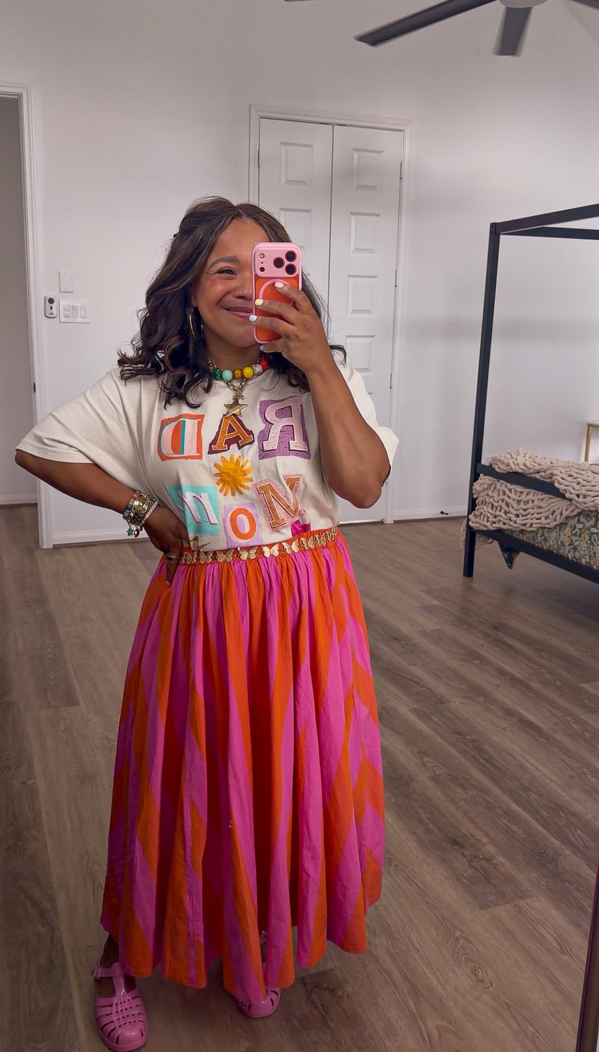 Spring mom outfit idea!!  Love the skirt + shirt combo! Wearing an XL for the tee for an oversized fit, medium in the skirt

#LTKmomlife #LTKootd