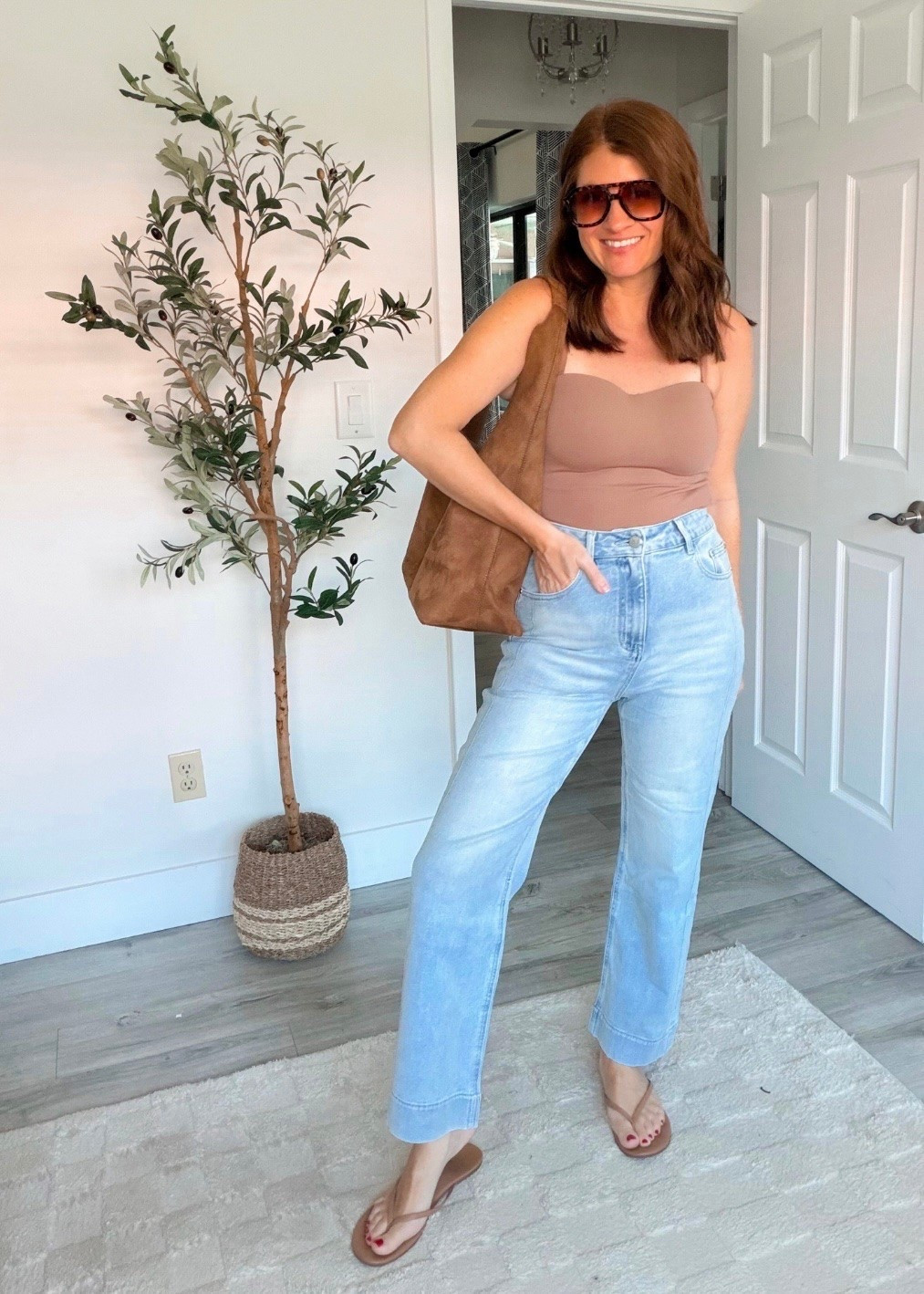This has to be the cutest spring outfit that is so simple, but so put together. This tank top is absolutely adorable and super flattering, the color of these jeans is stunning for spring. This look is a 10/10.

#LTKOver40 #LTKSeasonal #LTKmomlife
