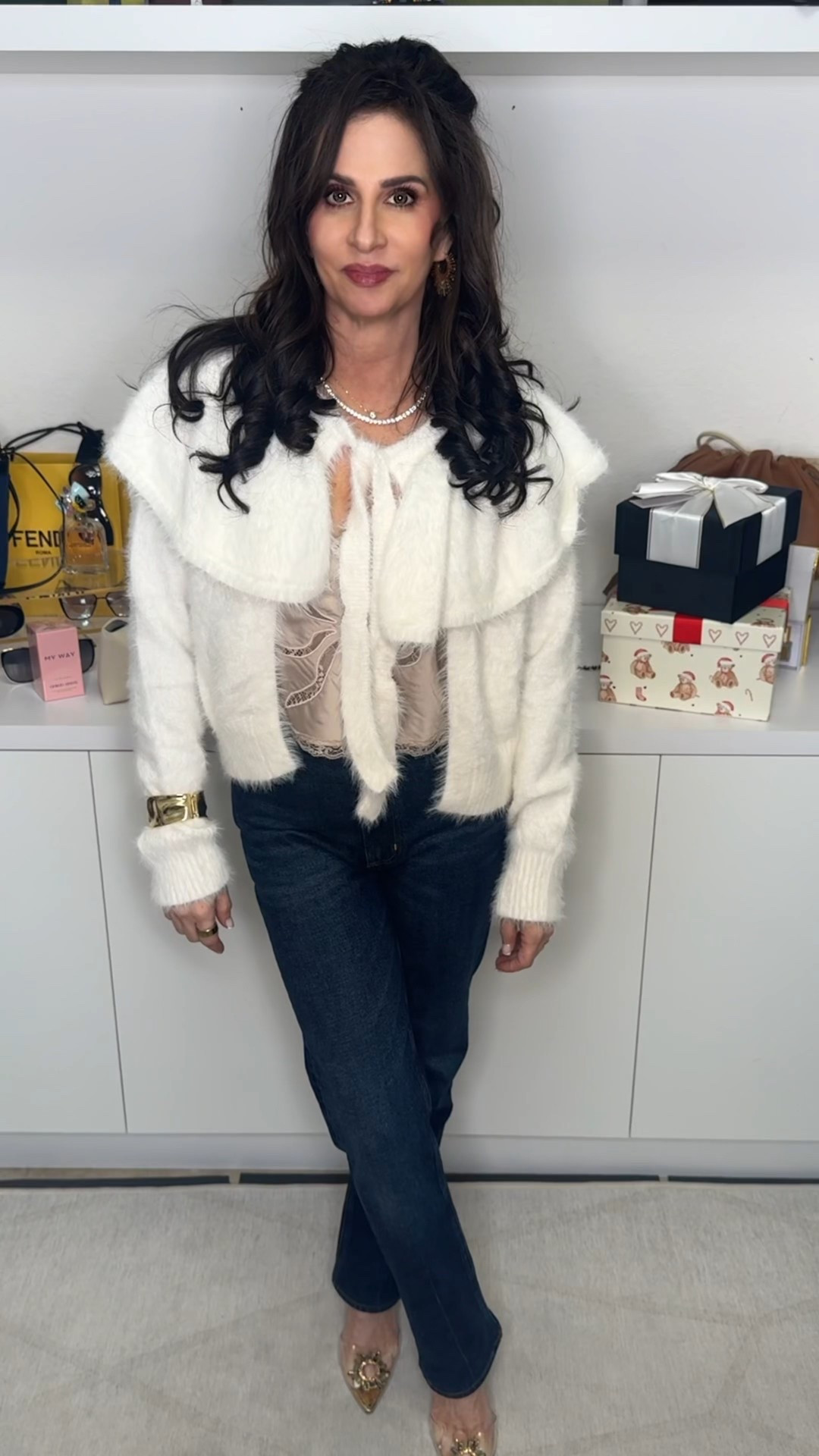 A fun winter look for when it is not that cold . Cami med , tie sweater sm , jeans 25 . Heals - went up 1/2 size . #casualwhitewinterlook #holidaypartyinspo 

#LTKSaleAlert #LTKSeasonal #LTKOver40

#LTKHoliday #LTKootd #LTKgrwm