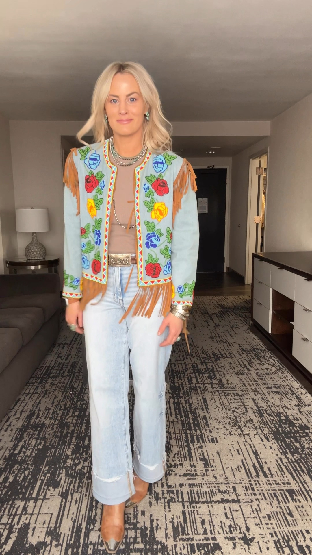 Our first full day of Vegas…and I’m pulling out the vintage. 

Size Details: 
Shirt- I’m in a medium, and I wish I would have sized up to a large…so consider sizing up! 

Jeans - I’m in a 27, and they fit perfect, so size down! 

Boots and Belt: True to size! 