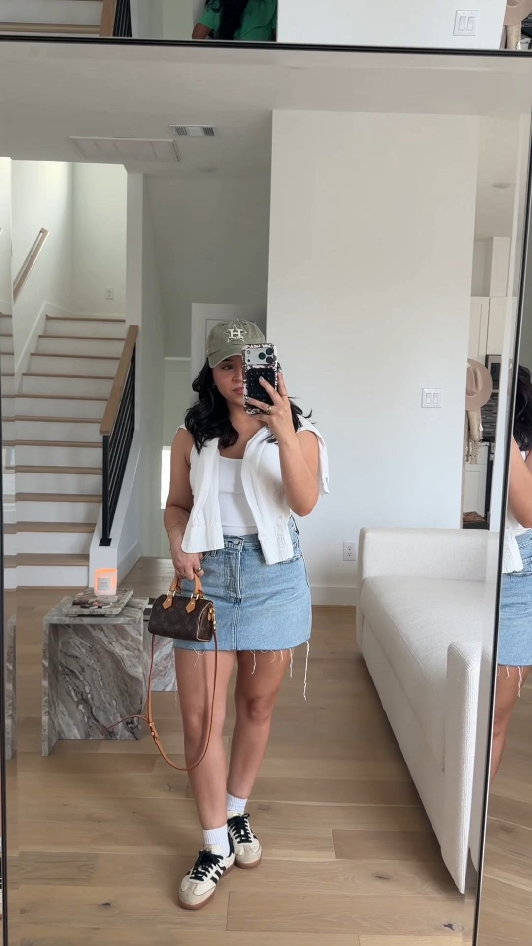 Baseball game outfit 
Tank: small
Button down: xs 
Denim skirt: 27 
White socks 
Sneakers: 5 men 

#LTKootd #LTKSpringSale #LTKdayinmylife