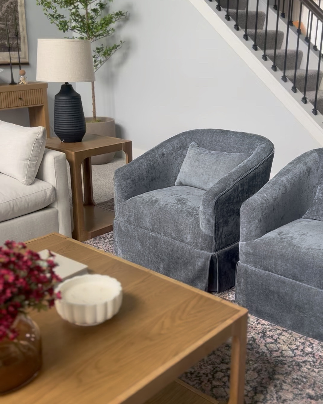 Wayfair find! Living room swivel chairs - these are the dark gray but definitely have a blue undertone they’re so pretty and the quality is amazing for the price! #livingroomstyle #accentchair #swivelchair #wayfair 

#LTKHome #LTKSaleAlert