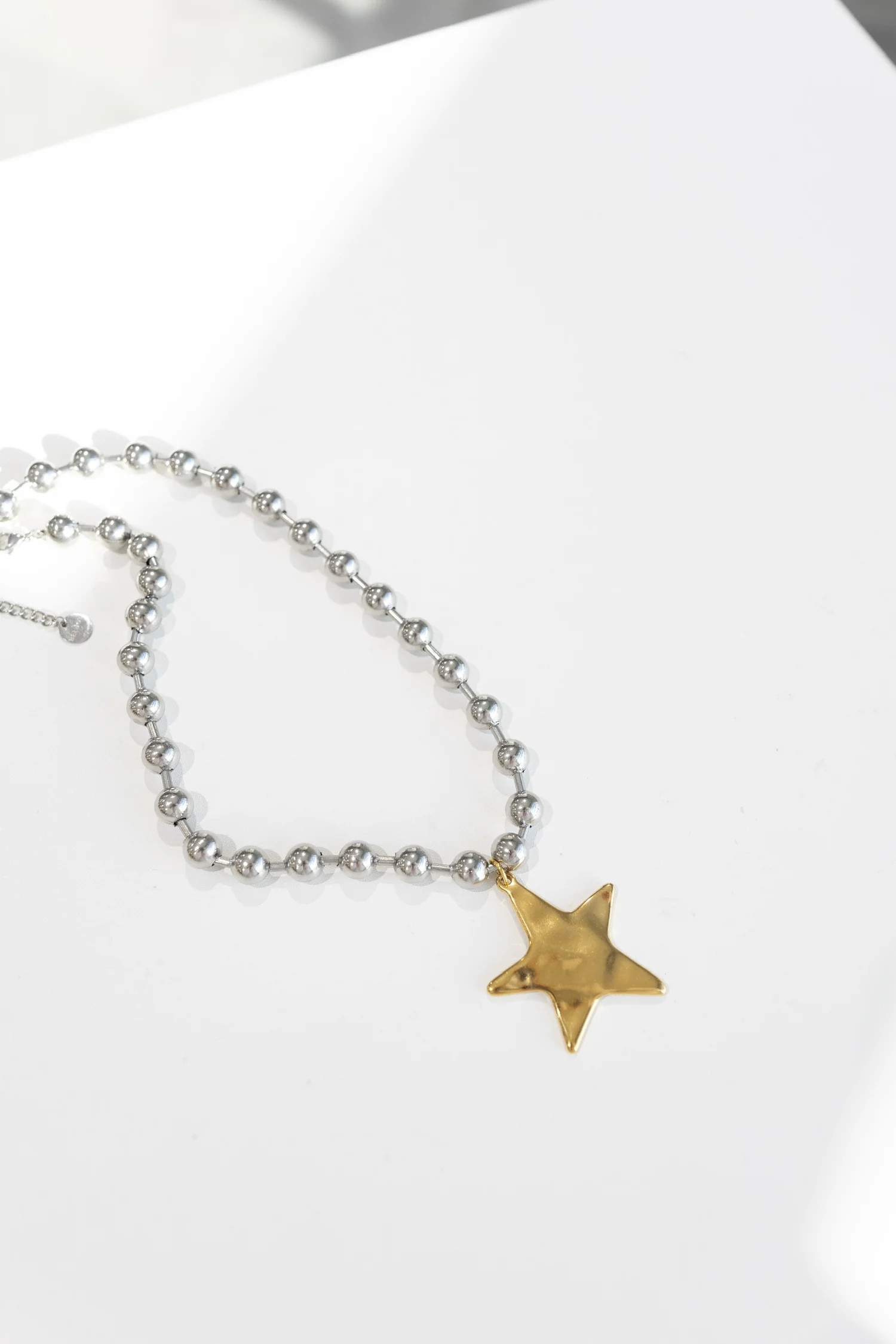 beljoy | barb & star necklace - silver with gold star | Etta+East